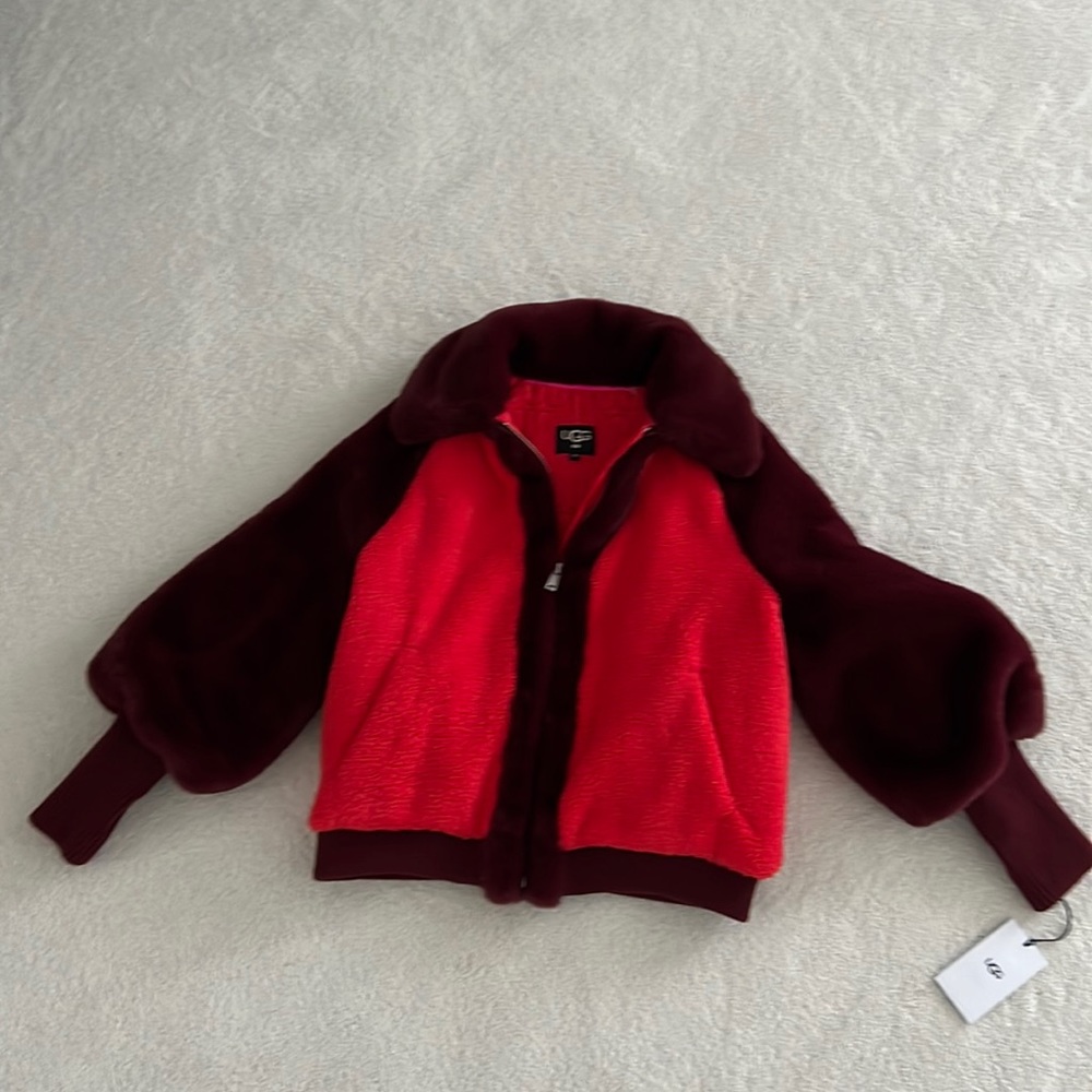 Uggs burgundy and red baseball jacket.